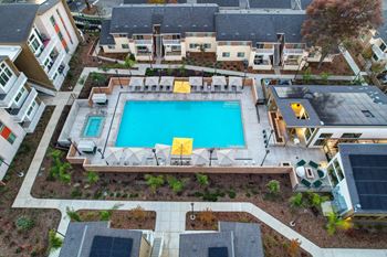 Swimming pool with cabana lounges